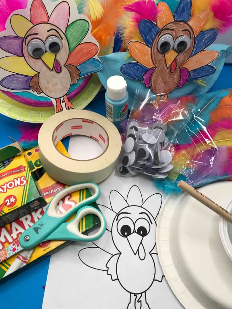 Thanksgiving Turkey Craft surrounded by craft materials