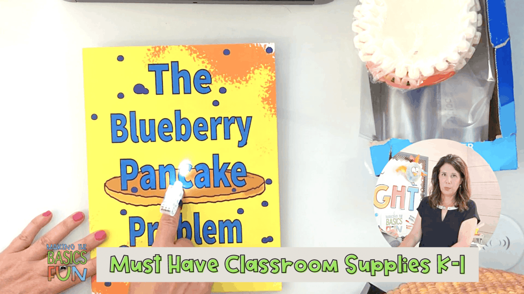 finger light on "The Blueberry Pancake Problem" picture book.