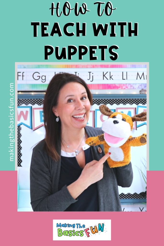 Teacher Angie pointing to Max the dog puppet in an elementary classroom